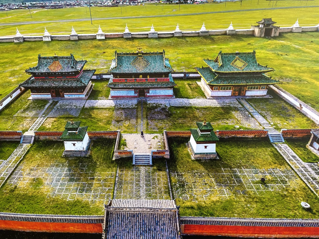 Aerial view of Erdene Zuu Monastery with traditional Mongolian temples and white stupas in Orkhon Valley